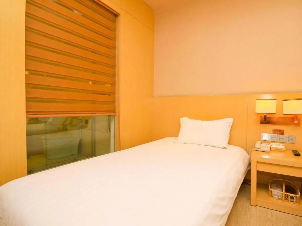 Bed in Xian I-OPAL Hotel