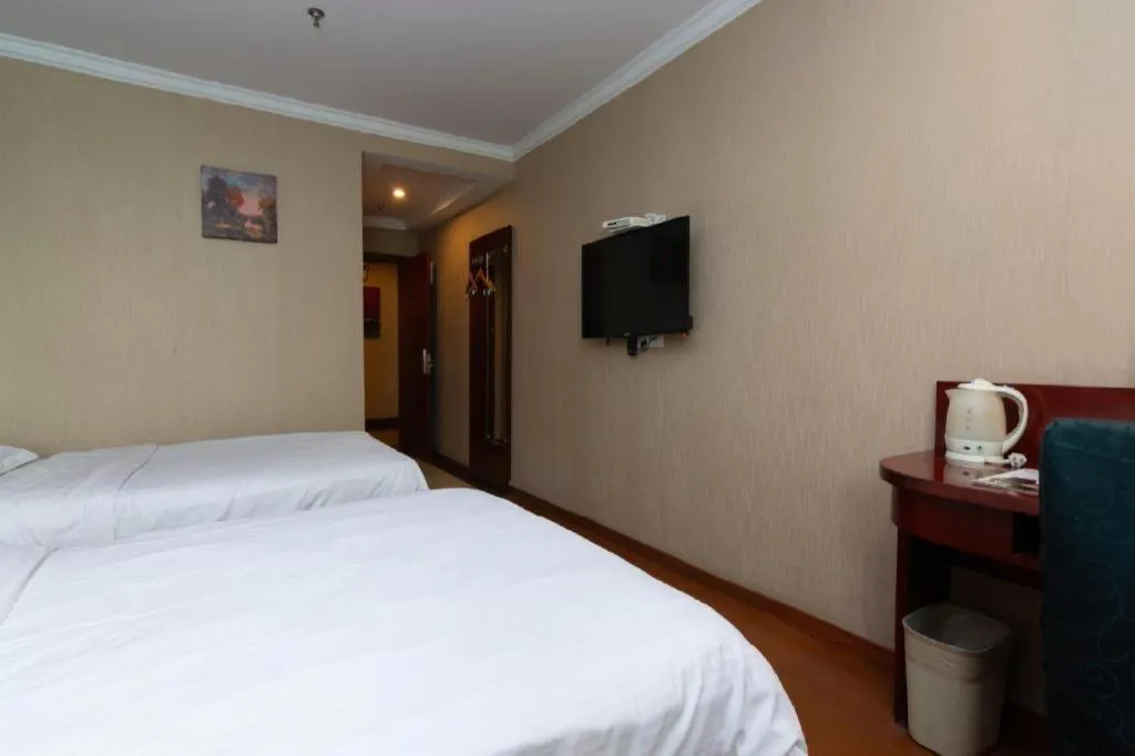 Bed in GreenTree Inn Shanghai Songjiang Xinqiao Jiuxin Road Express Hotel