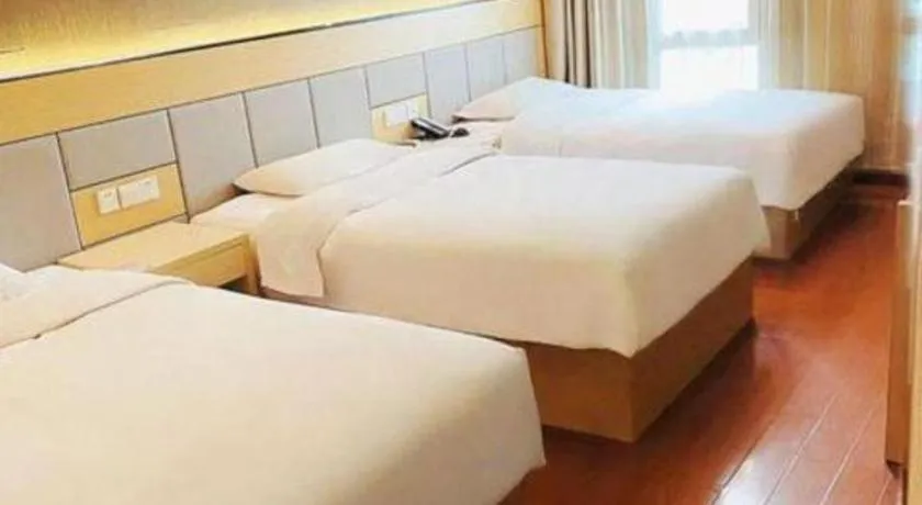 Bed in GreenTree Inn Shanghai Songjiang Xinqiao Jiuxin Road Express Hotel