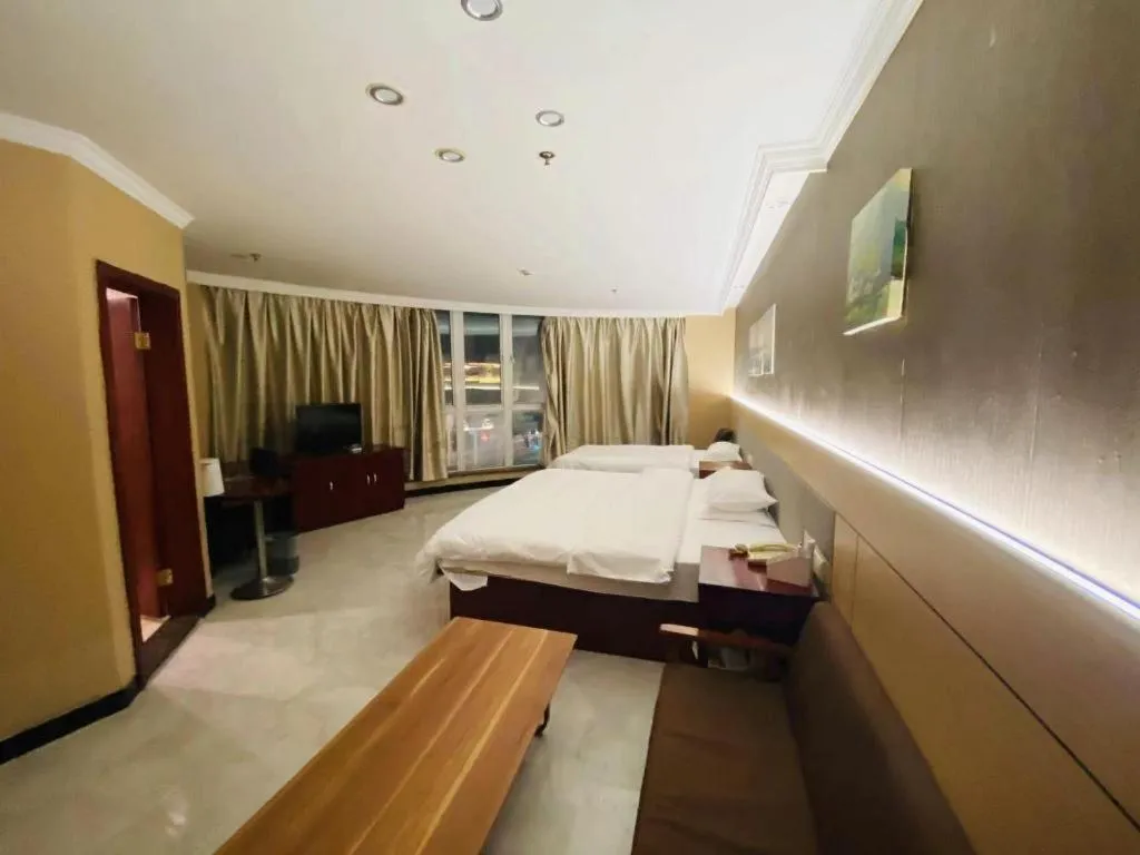 Bed in GreenTree Inn Shanghai Songjiang Xinqiao Jiuxin Road Express Hotel