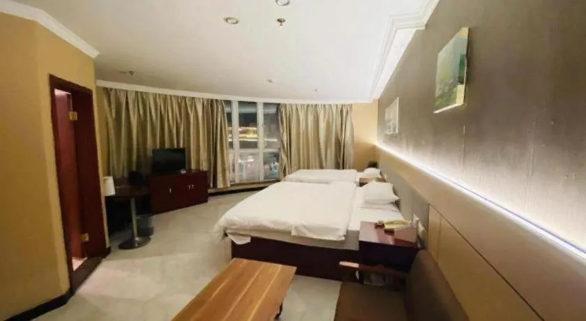 Bed in GreenTree Inn Shanghai Songjiang Xinqiao Jiuxin Road Express Hotel