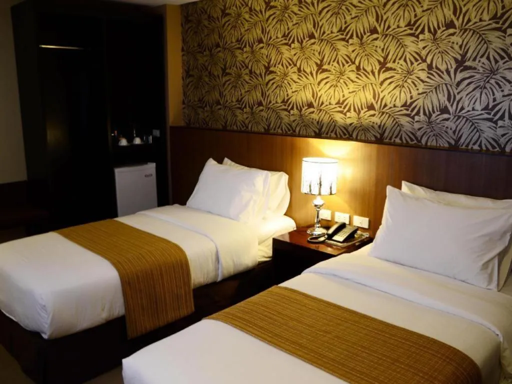 Bed in GT Hotel Bacolod