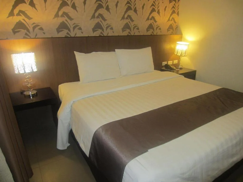 Bed in GT Hotel Bacolod