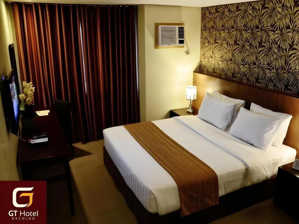 Bed in GT Hotel Bacolod