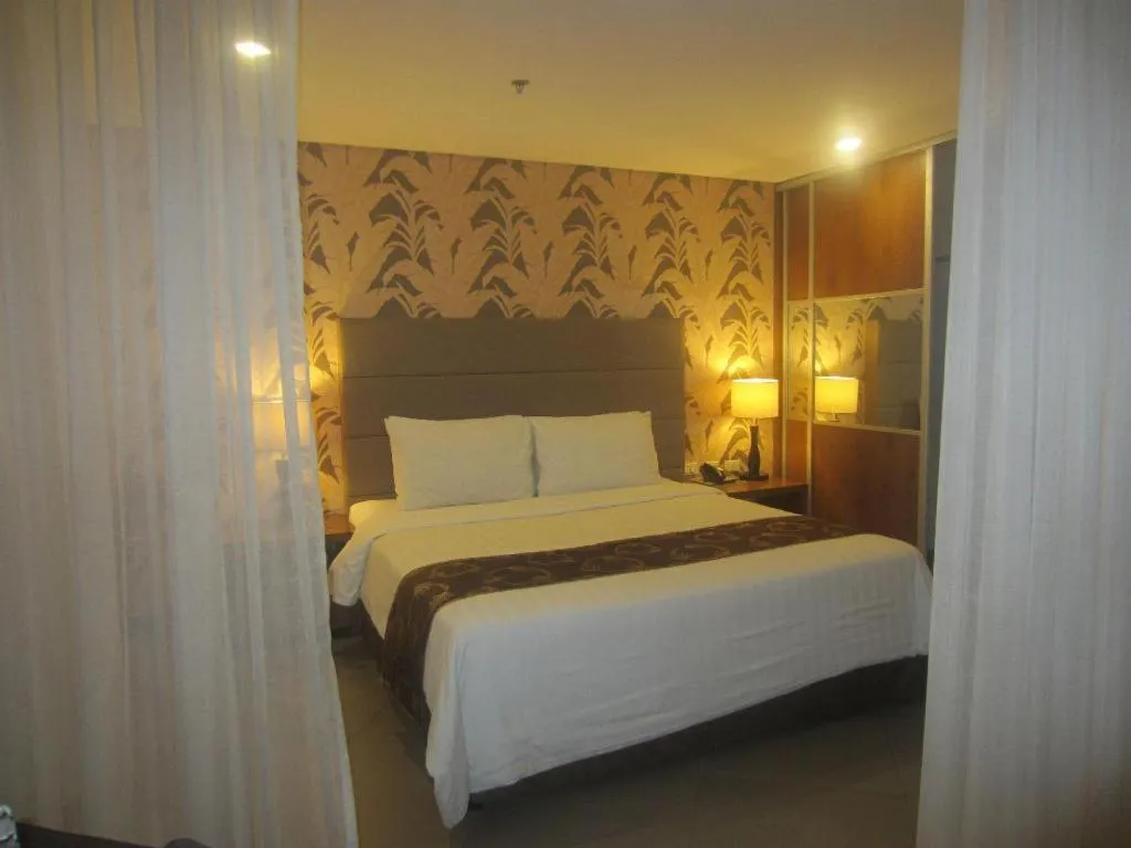 Bed in GT Hotel Bacolod