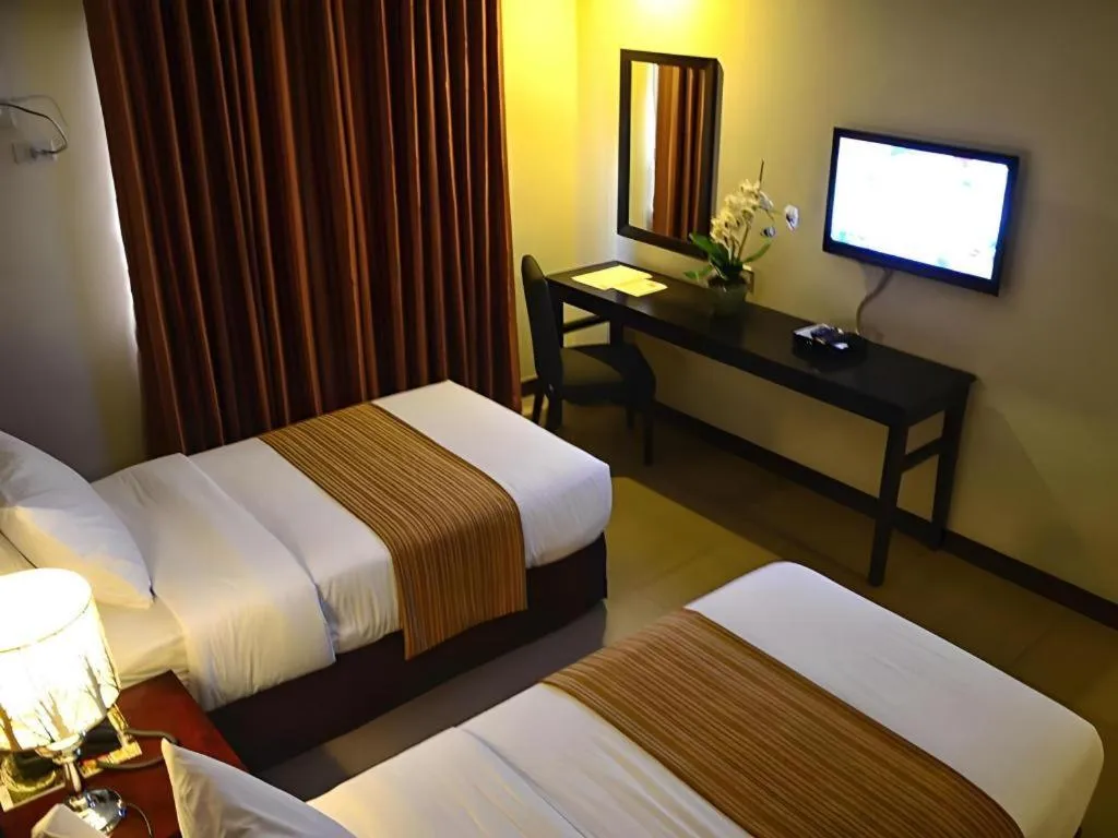 Bed in GT Hotel Bacolod