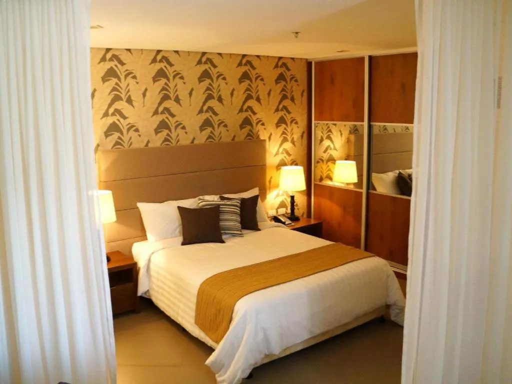 Bed in GT Hotel Bacolod