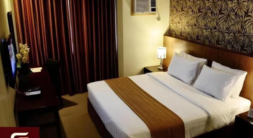 Bed in GT Hotel Bacolod