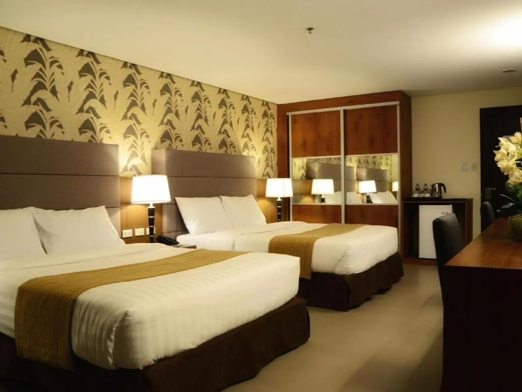 Bed in GT Hotel Bacolod