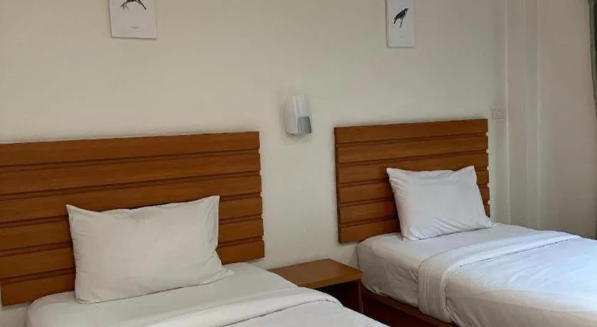 Bed in Ponburi Hotel