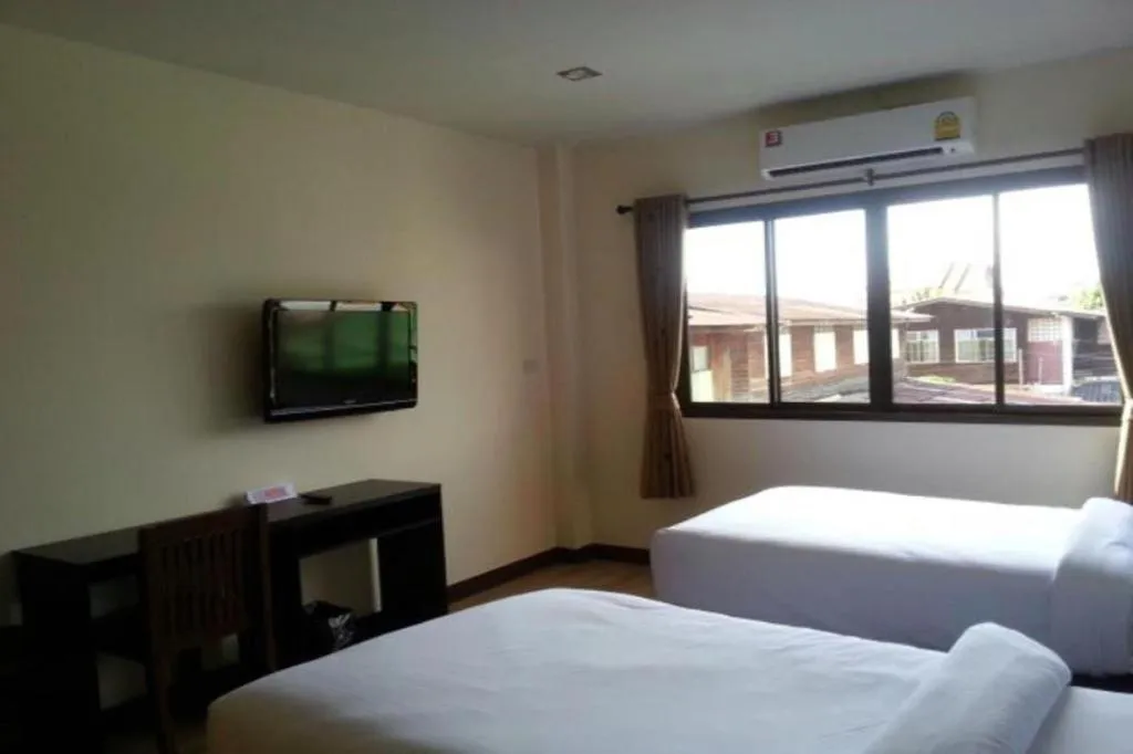 Bed in Ponburi Hotel