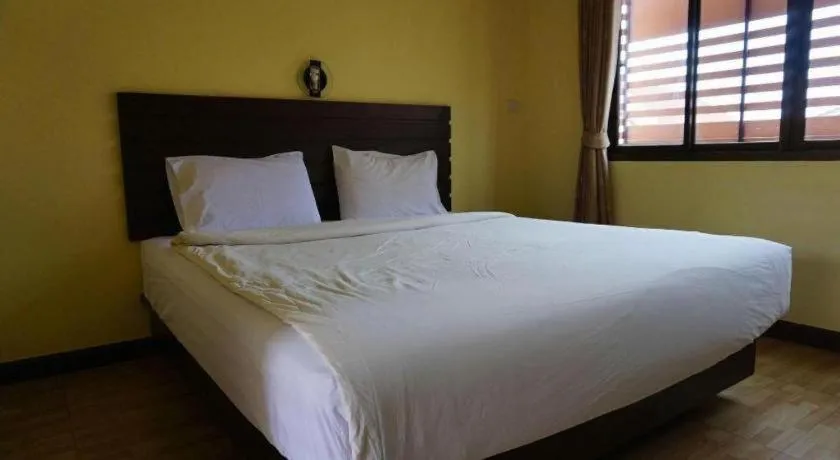 Bed in Ponburi Hotel