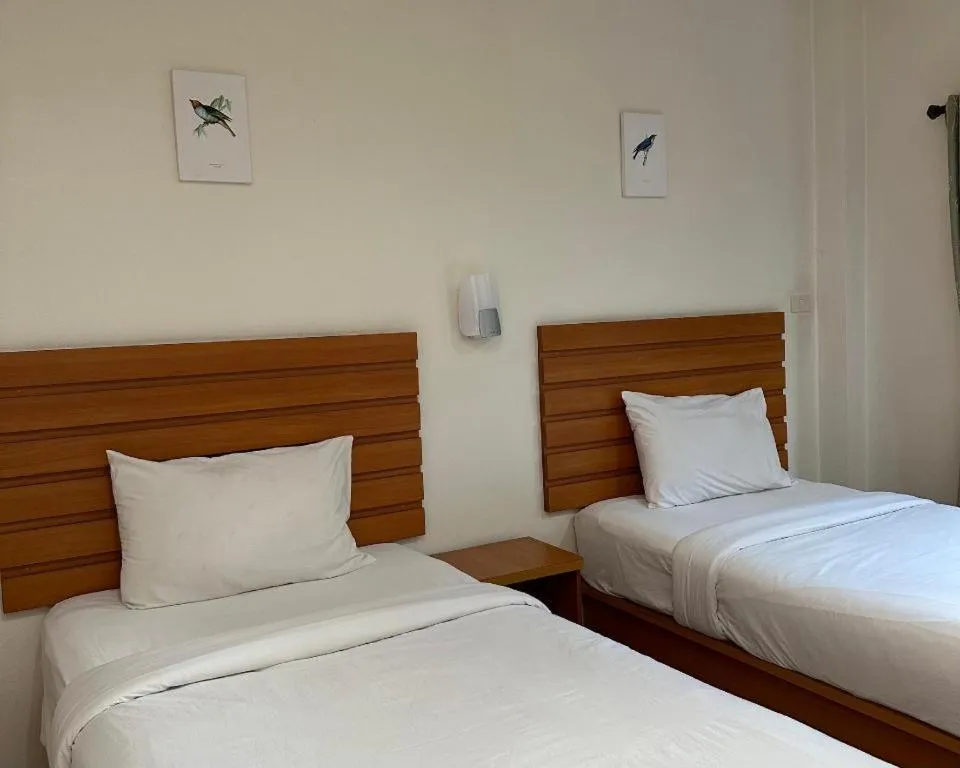 Bed in Ponburi Hotel