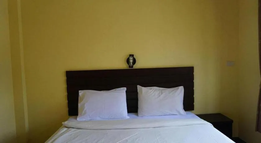 Bed in Ponburi Hotel