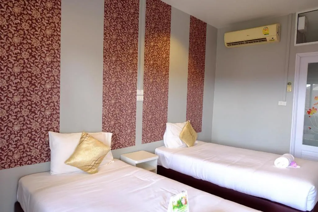 Bed in Winhouse Hotel