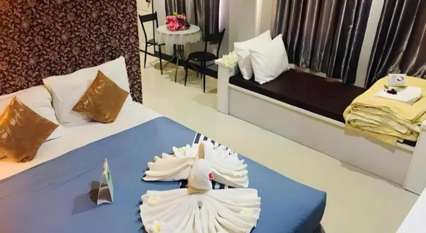 Bed in Winhouse Hotel