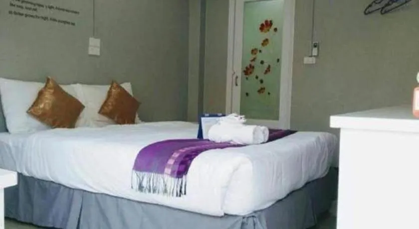 Bed in Winhouse Hotel