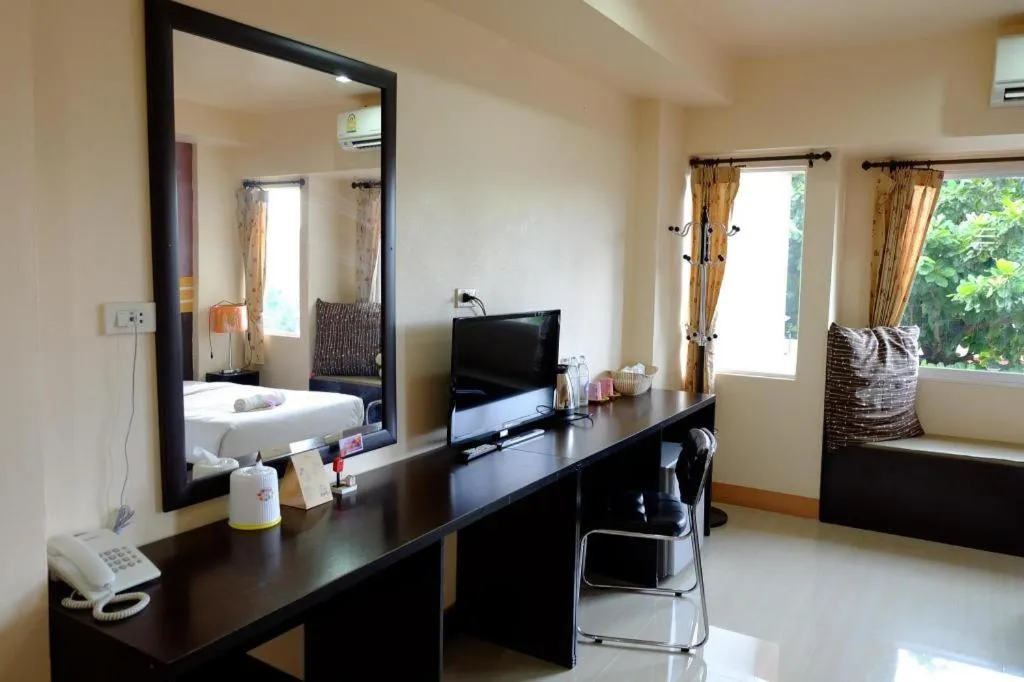 Bed in Winhouse Hotel