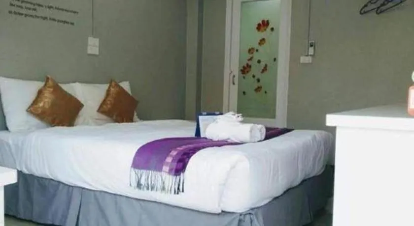 Bed in Winhouse Hotel