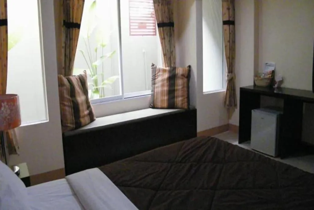 Bed in Winhouse Hotel