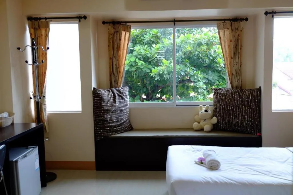 Bed in Winhouse Hotel