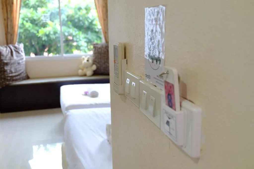 Bed in Winhouse Hotel