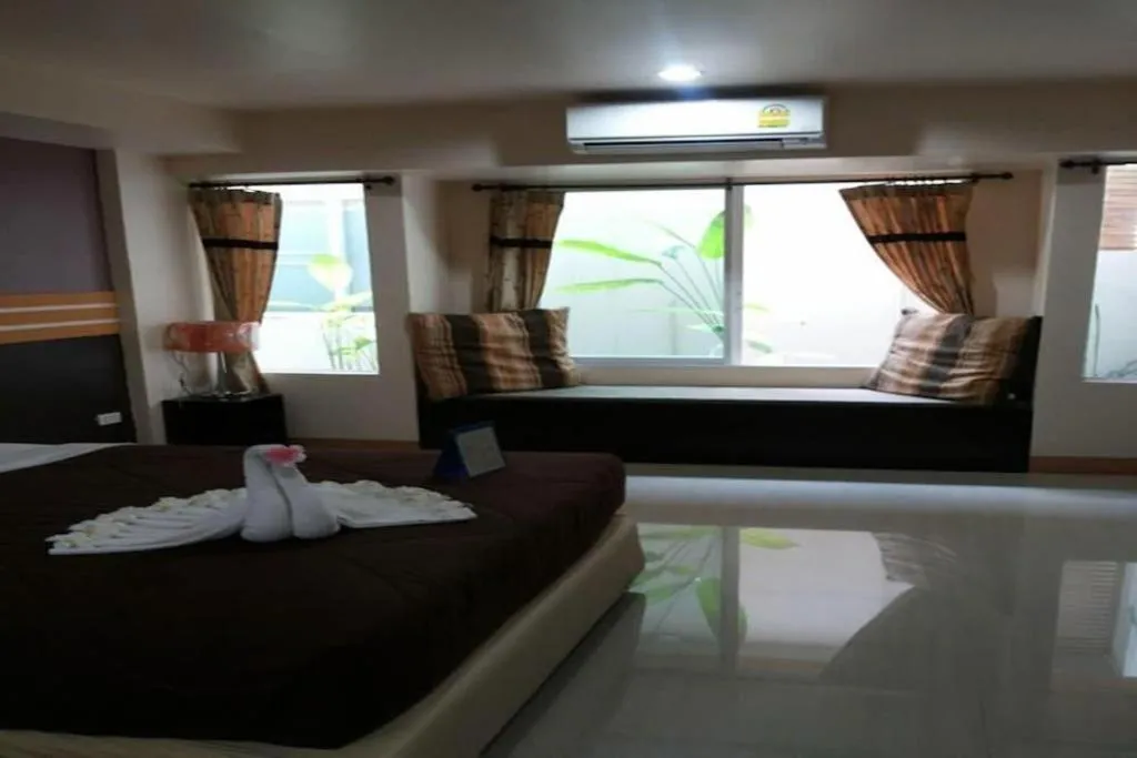 Bed in Winhouse Hotel