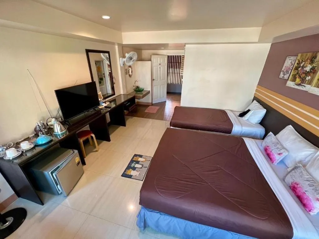 Bed in Winhouse Hotel