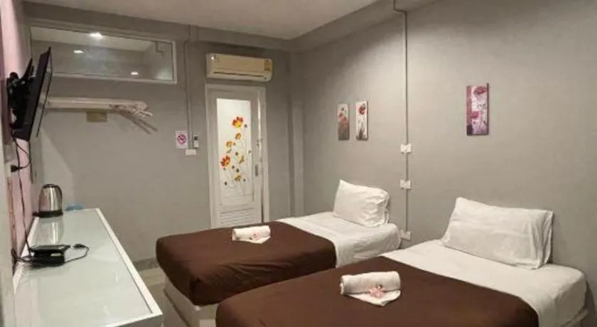 Bed in Winhouse Hotel