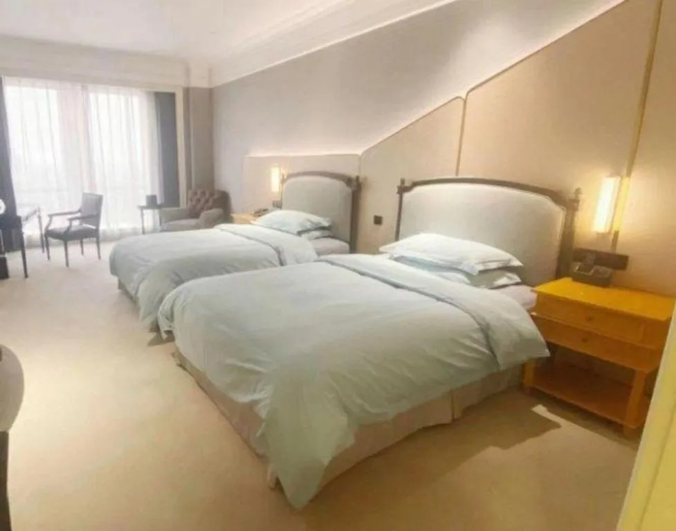 Bed in Zhejiang D.H Hotel