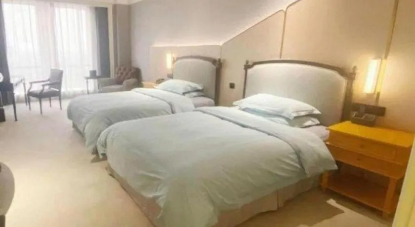 Bed in Zhejiang D.H Hotel