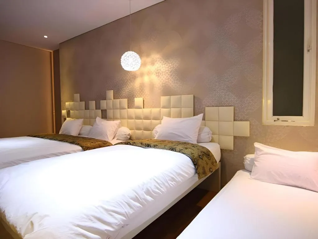 Bed in Griya Jogja Hotel