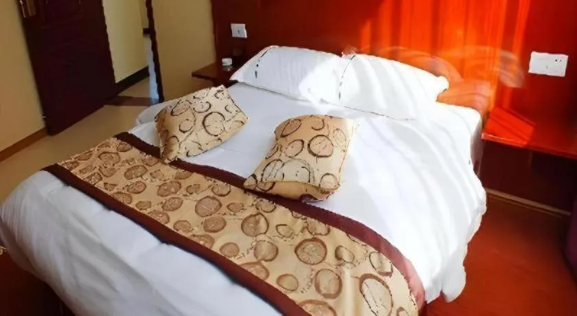 Bed in Lijiang Precious Dream Hotel