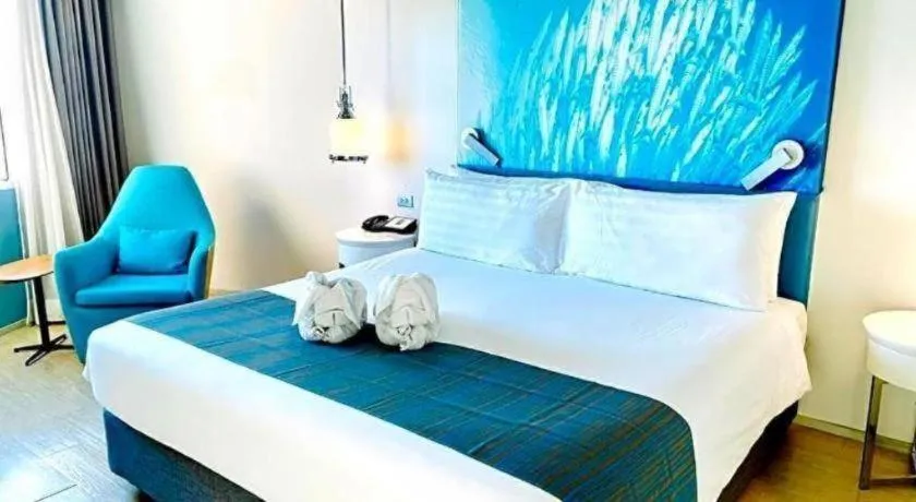 Bed in Grand Scenaria Hotel