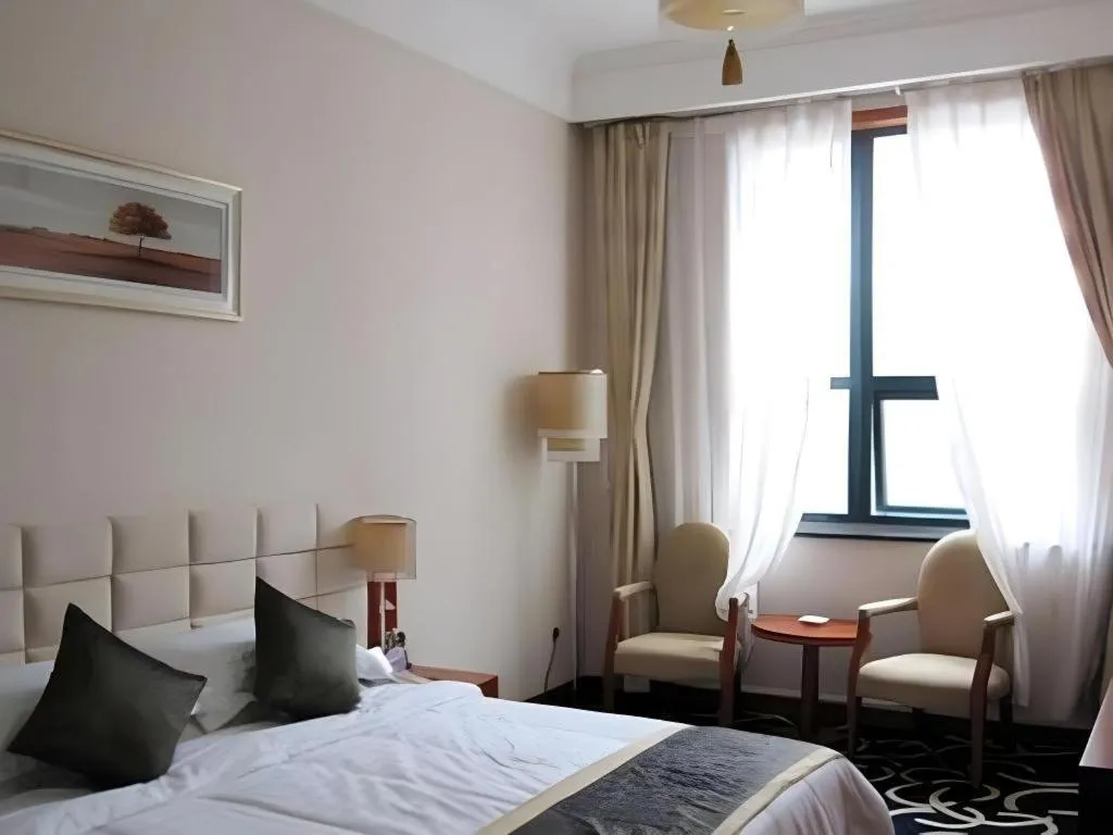 Bed in Pingdingshan Feixing Crowne Plaza Hotel