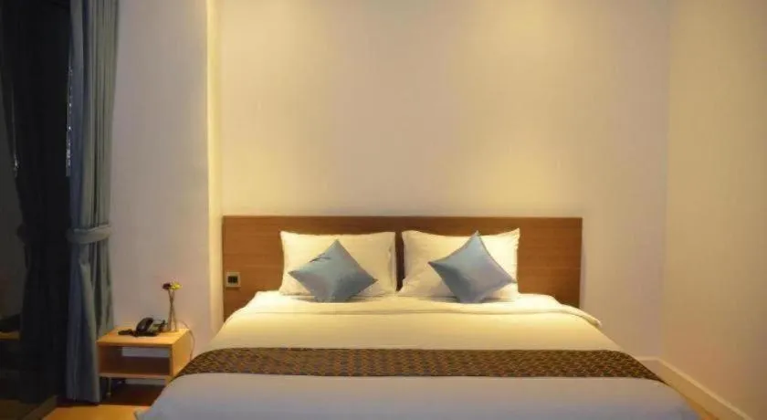 Bed in The Scenery City Hotel