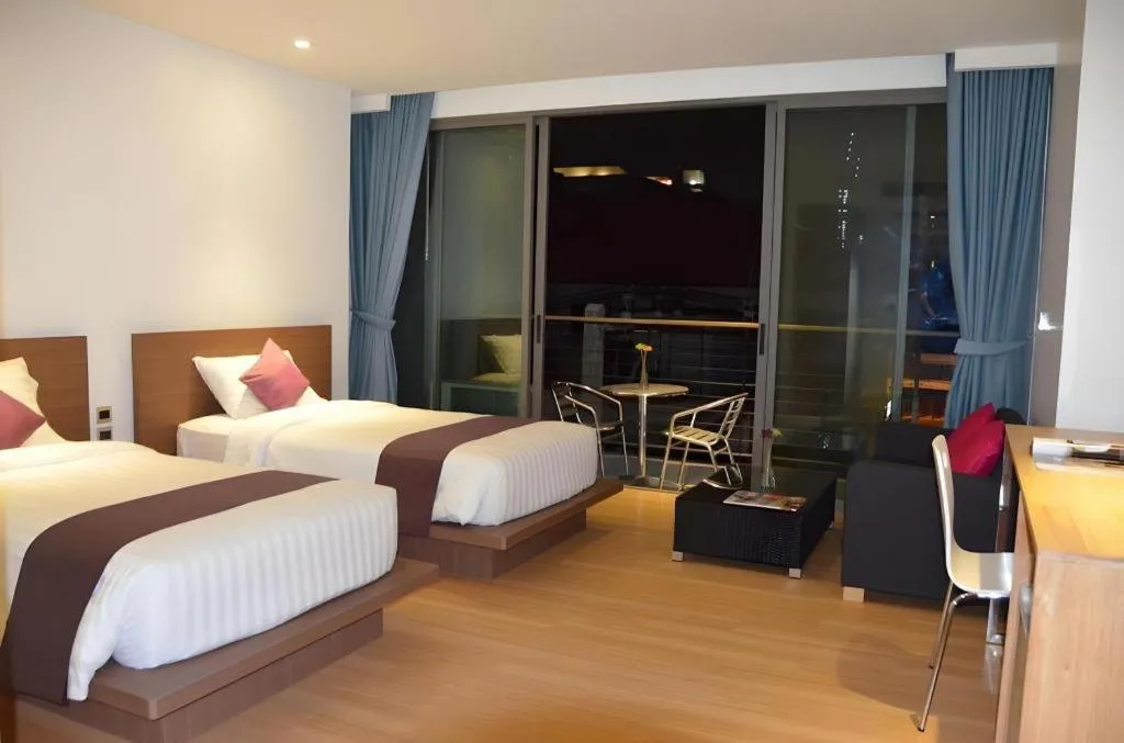 Bed in The Scenery City Hotel