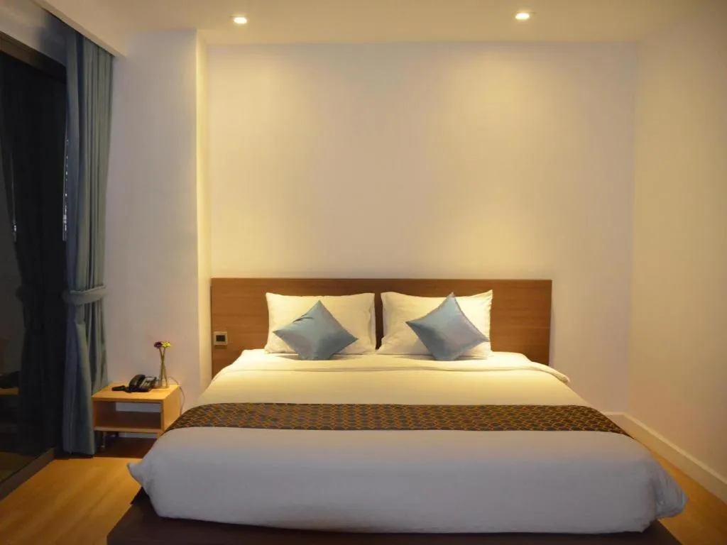 Bed in The Scenery City Hotel