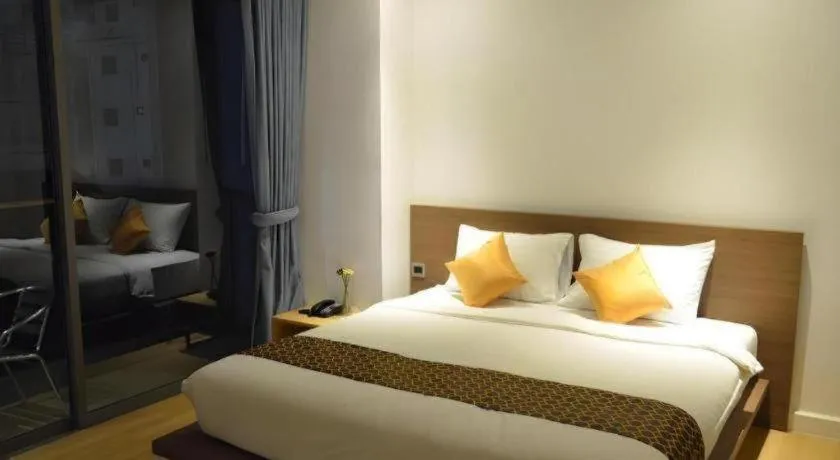 Bed in The Scenery City Hotel