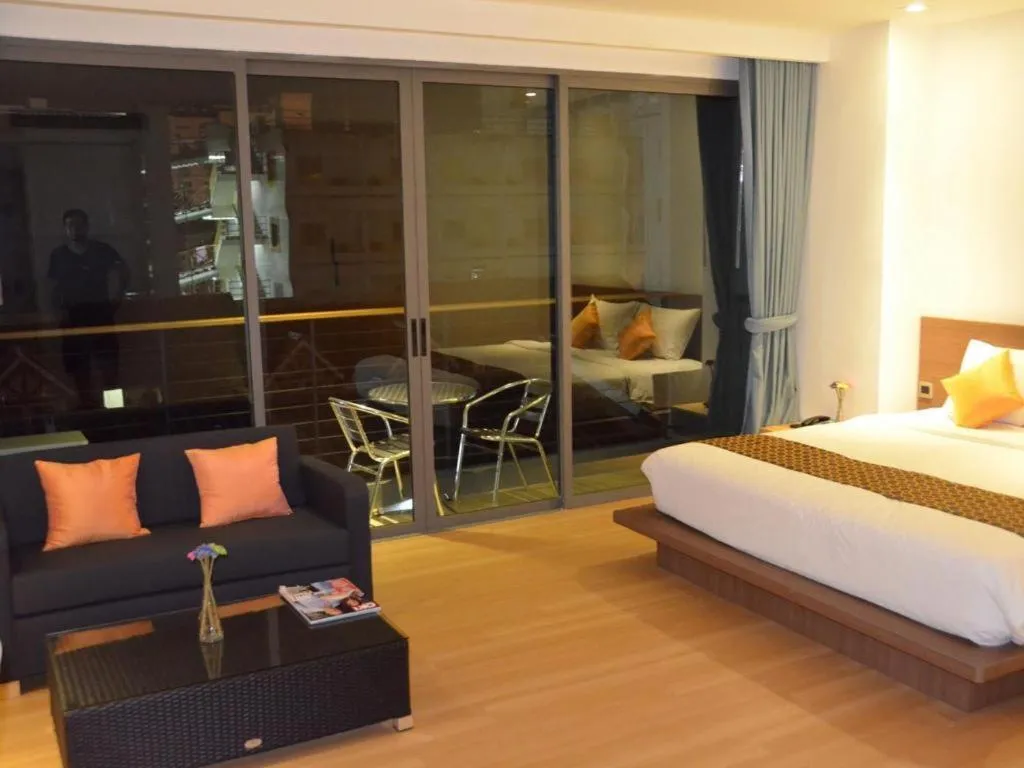 Bed in The Scenery City Hotel