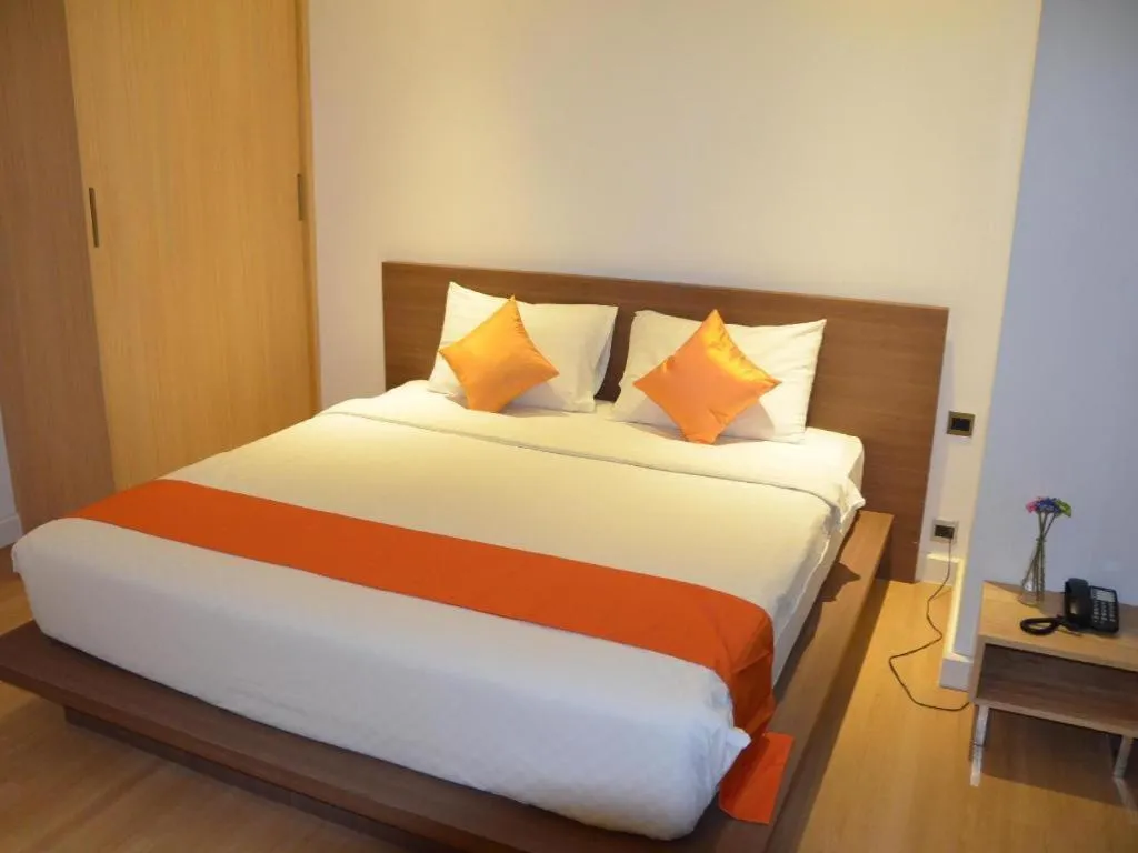 Bed in The Scenery City Hotel