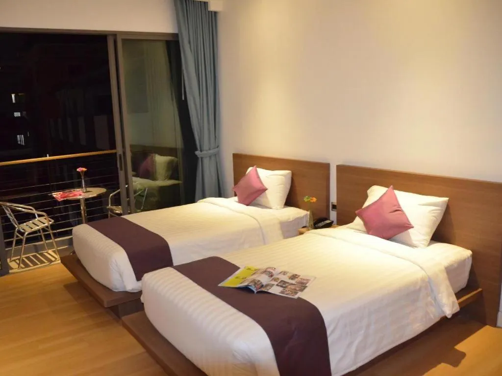 Bed in The Scenery City Hotel