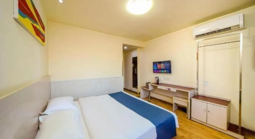 Bed in Kunlun Leju Business Hotel Kaifeng Gulou