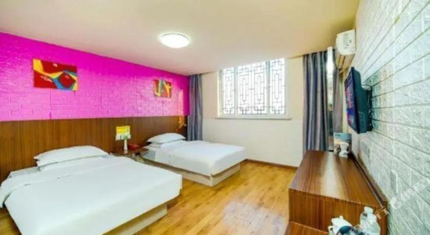 Bed in Kunlun Leju Business Hotel Kaifeng Gulou