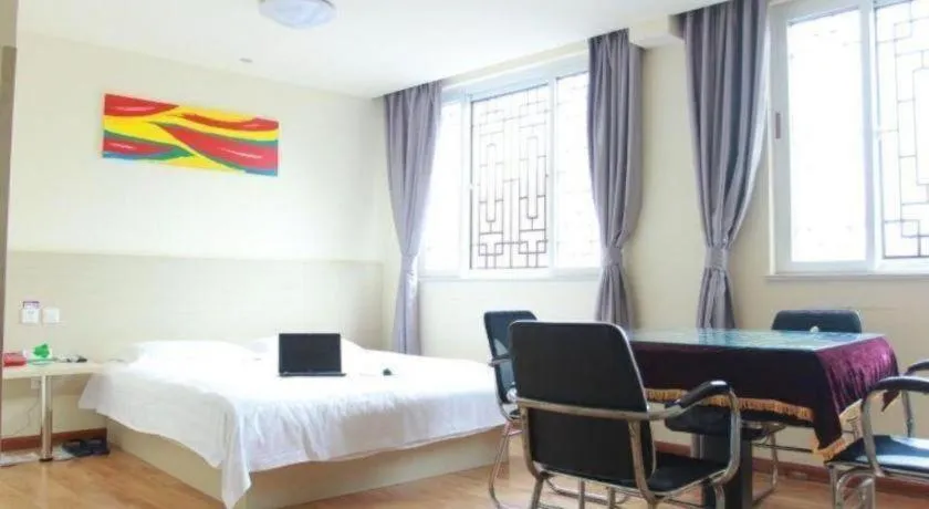 Bed in Kunlun Leju Business Hotel Kaifeng Gulou