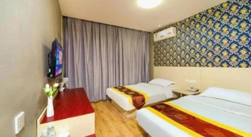 Bed in Kunlun Leju Business Hotel Kaifeng Gulou