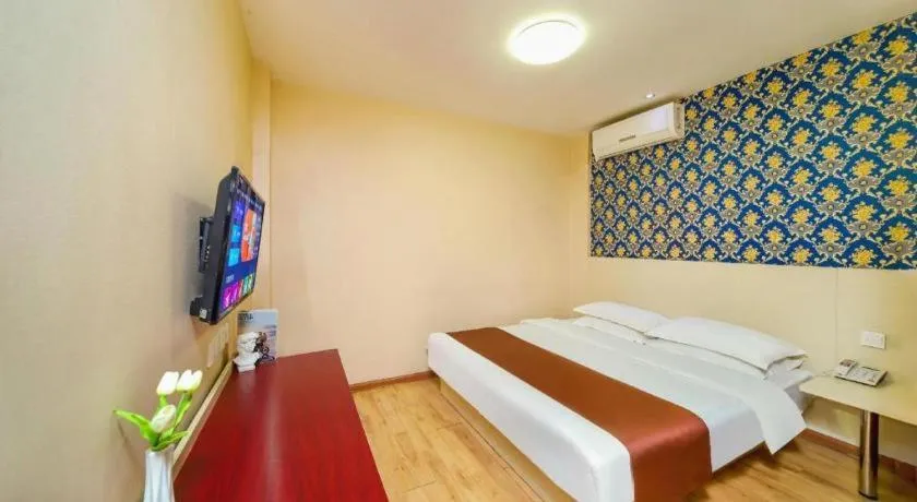 Bed in Kunlun Leju Business Hotel Kaifeng Gulou