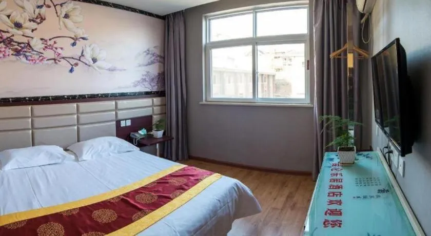 Bed in Kunlun Leju Business Hotel Kaifeng Gulou