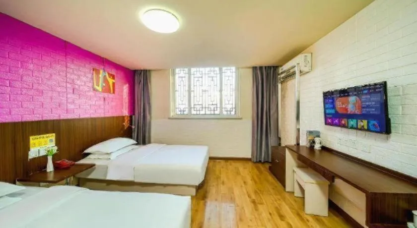 Bed in Kunlun Leju Business Hotel Kaifeng Gulou