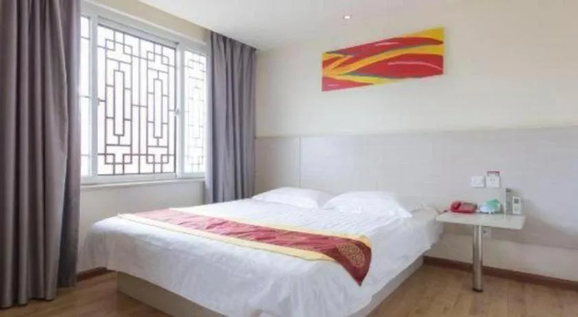 Bed in Kunlun Leju Business Hotel Kaifeng Gulou